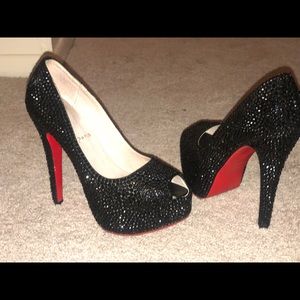 Christian Louboutin black studded heels!